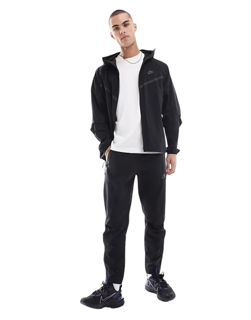 Nike: Men's Woven Open Hem Trousers